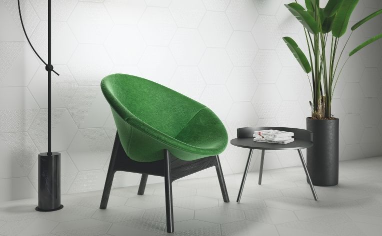 green furniture and plant on tile flooring